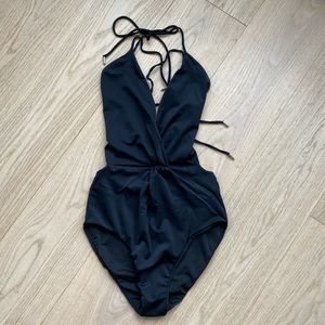 Black Lavish Alice one-piece suit with lace up back & twist front detail small